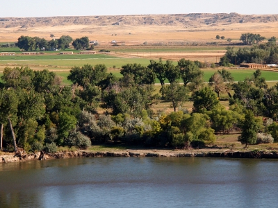 [Lots more trees near the river's edge in this photo than the prior ones.]