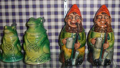 [Four steins of which two are shaped and painted like frogs and two look like gnomes.]